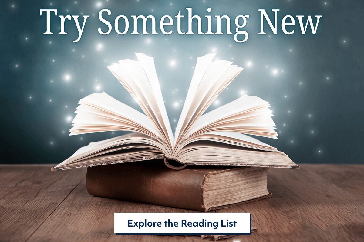 An open book with its pages fanned out sits on top of a closed book on a wooden table, with sparkling lights in the background. Text reads, Try Something New and Explore the Reading List.
