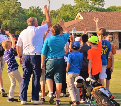 Youth golfers with a PGA instructor at Forest Creek Golf Club