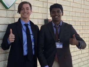 Zach Moser and Mainur Khan, Round Rock High students and members of the Austin Teen Coalition, give a thumbs up to voter registration.
