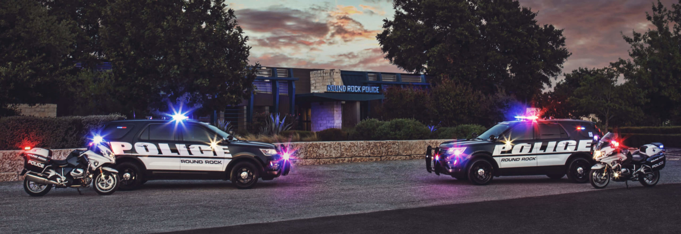 police station with vehicles