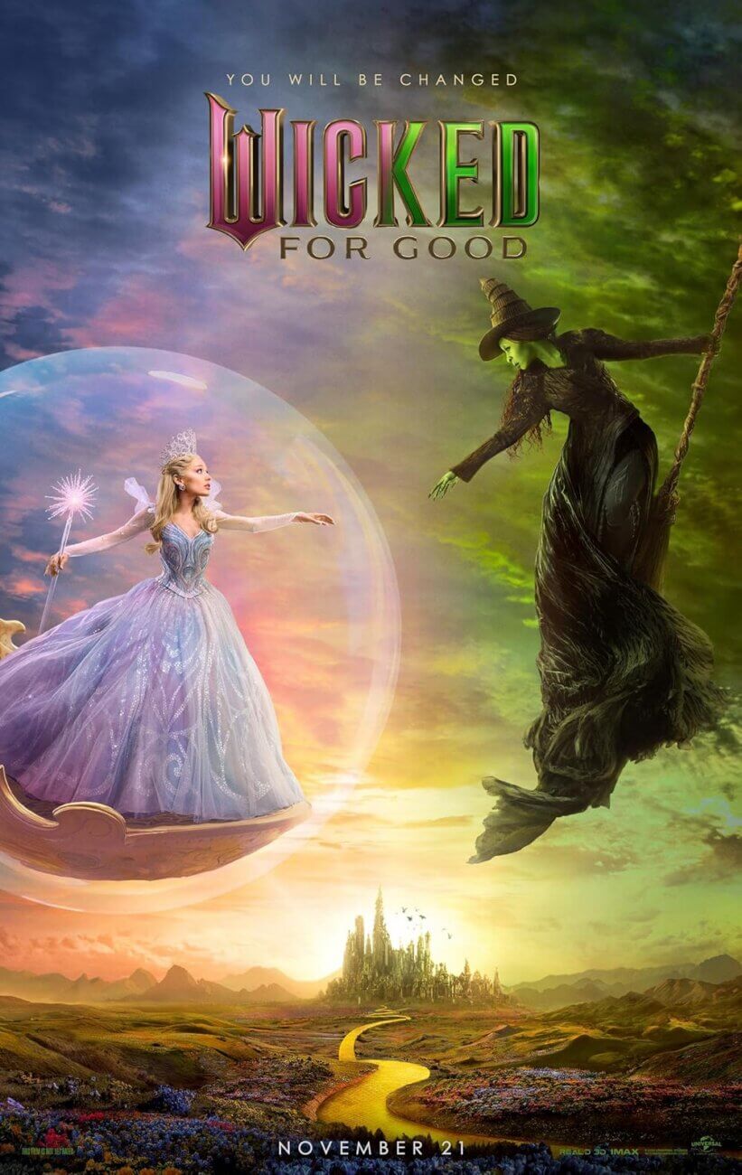 A fairy in a sparkling blue dress floats inside a bubble, facing a green-skinned witch in black, flying on a broom. They hover over a colorful landscape with a golden road leading to a distant city. Text: Wicked For Good, November 27.