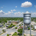Aerial photo of Downtown Round Rock with water tower prominently featured