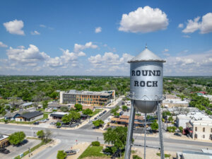 Aerial photo of Downtown Round Rock with water tower prominently featured