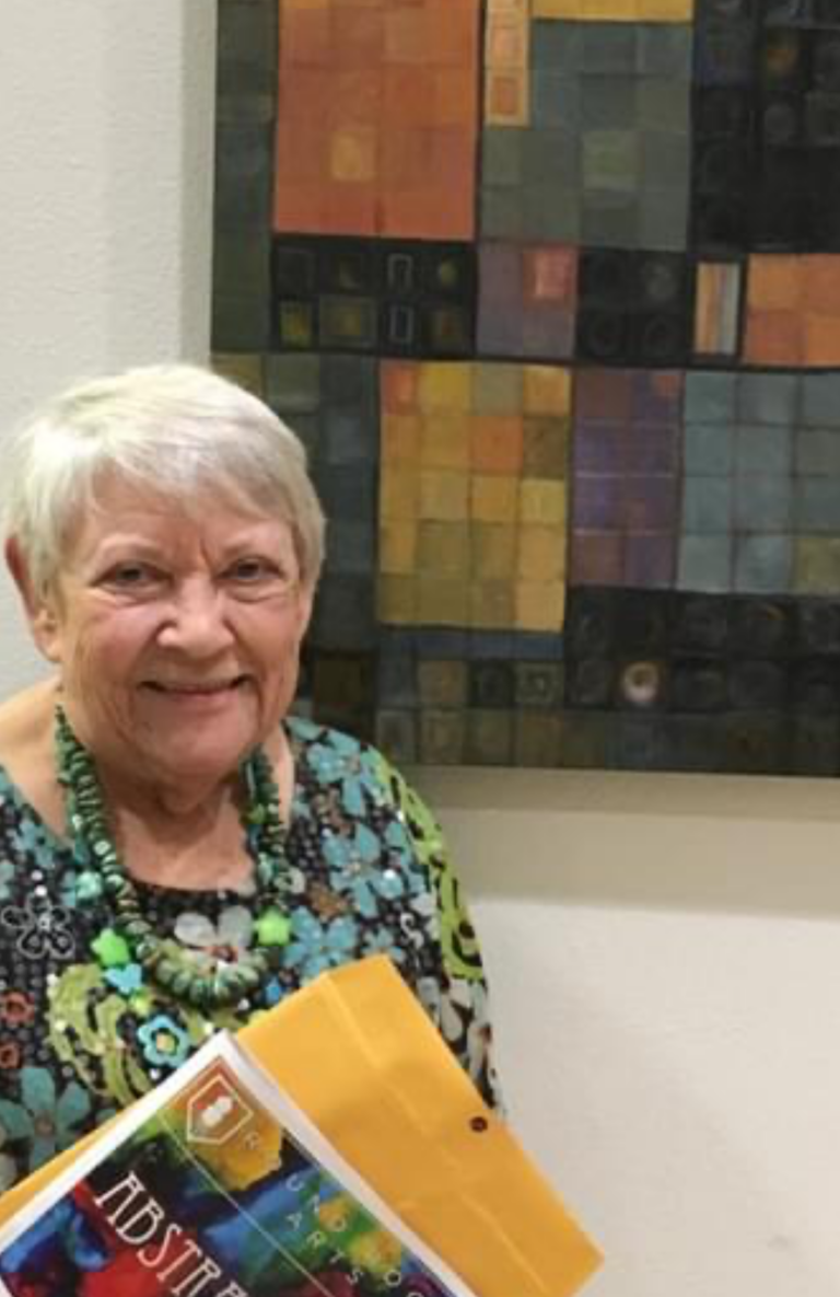 Nelda at Abstraction exhibit where she won top prize - Texas State University Campus