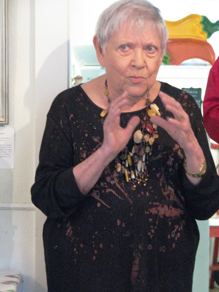 Nelda speaks at solo exhibit reception at Papi's Pies 2