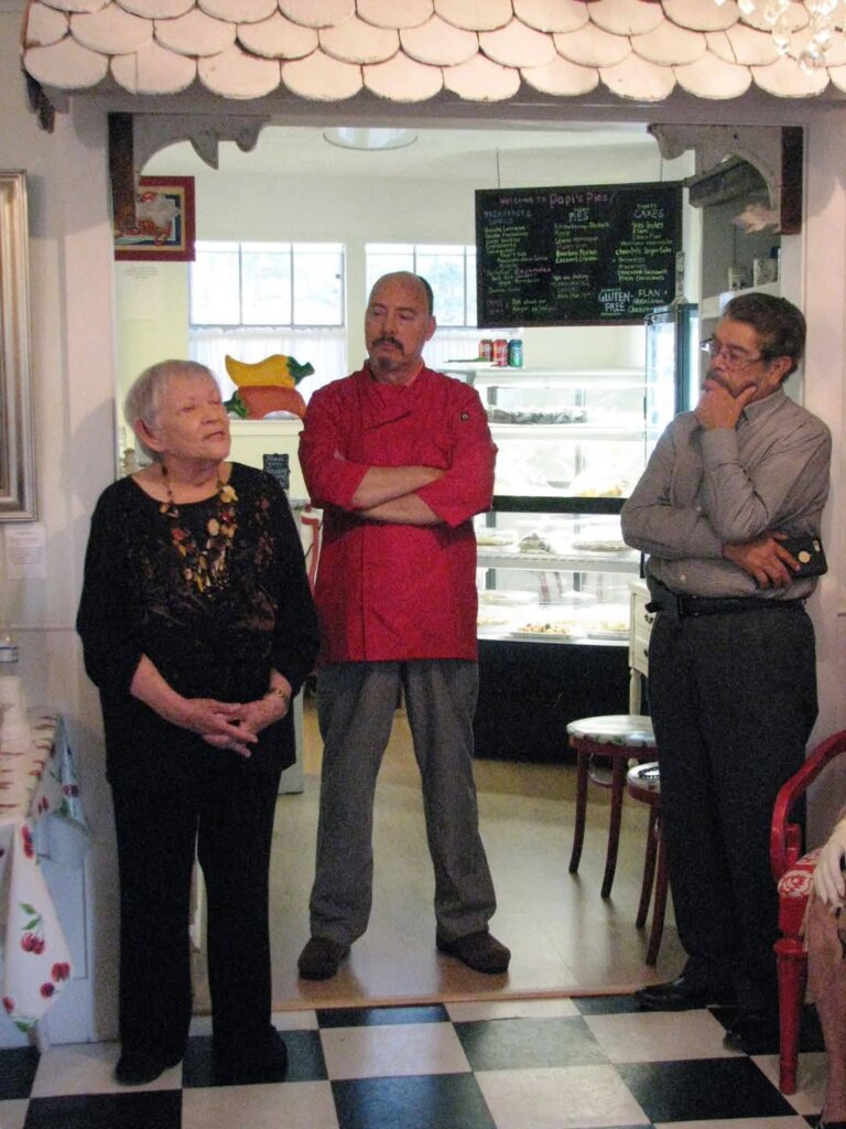 Nelda speaks at solo exhibit reception at Papi's Pies 3