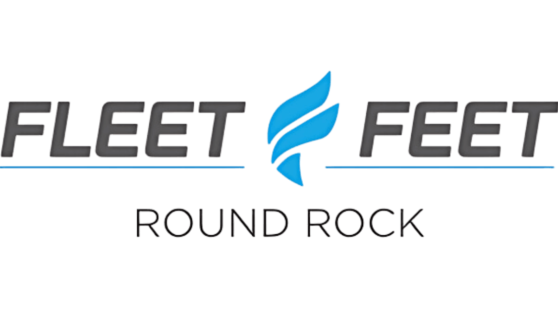 The logo for Fleet Feet Round Rock features the words “FLEET FEET” in bold gray letters, separated by a blue stylized wing, with “ROUND ROCK” in black capital letters below.