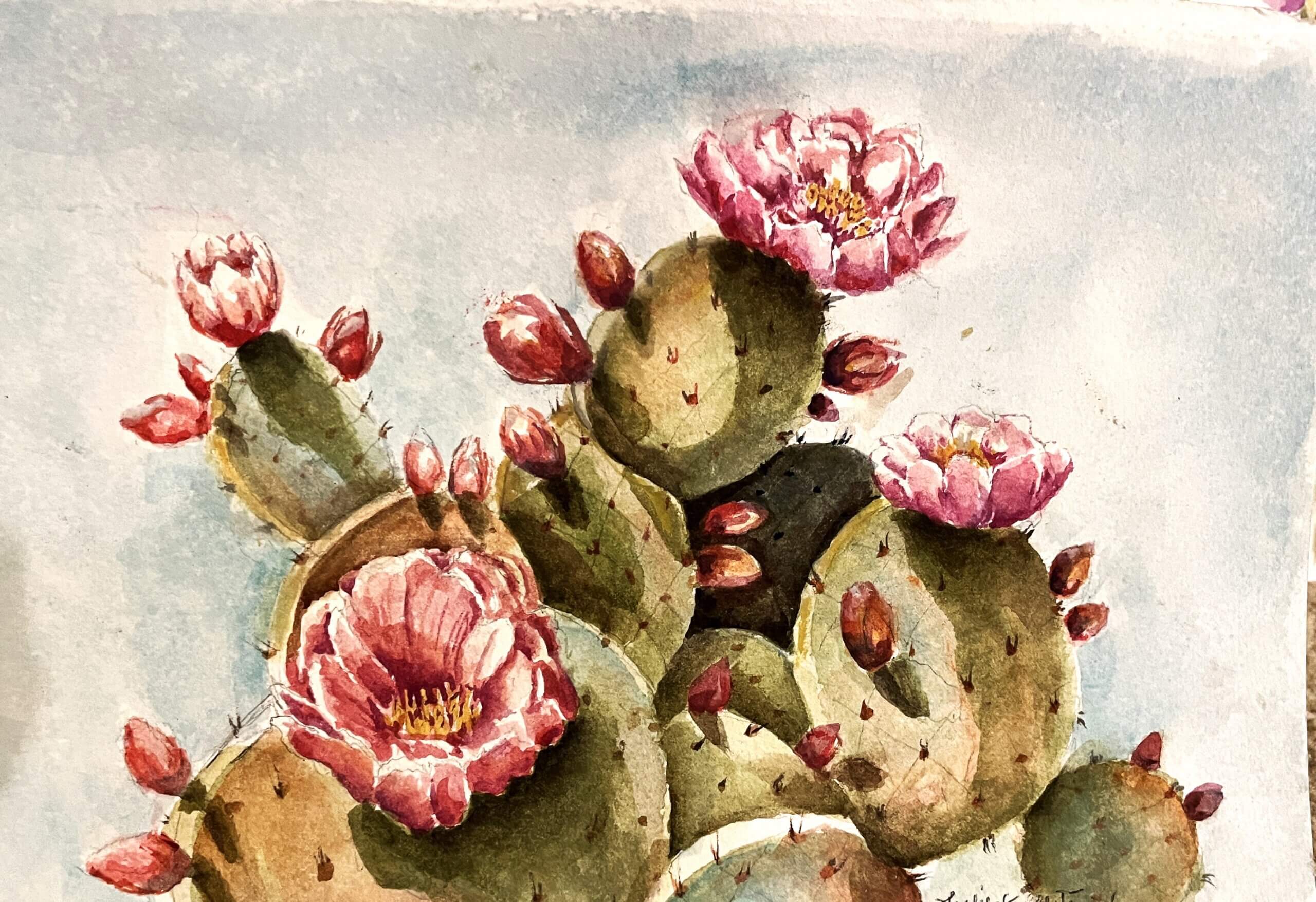 Watercolor painting of a prickly pear cactus with green pads, red spines, and several large pink flowers blooming on top, set against a light blue background.