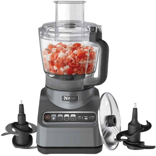 A dark gray food processor with silver Ninja logo. Also, a black dough blade, black chopping blade, and silver grating plate.