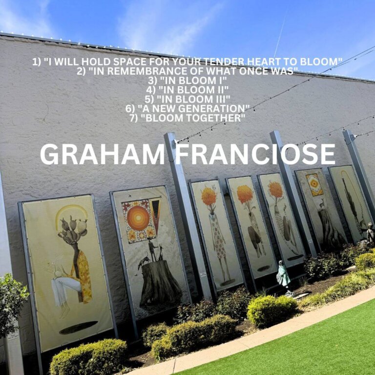 Seven tall art panels by Graham Franciose stand outdoors, each featuring abstract and botanical designs. Titles of the works are listed in white text over the image, with blue sky and trimmed bushes in the foreground.