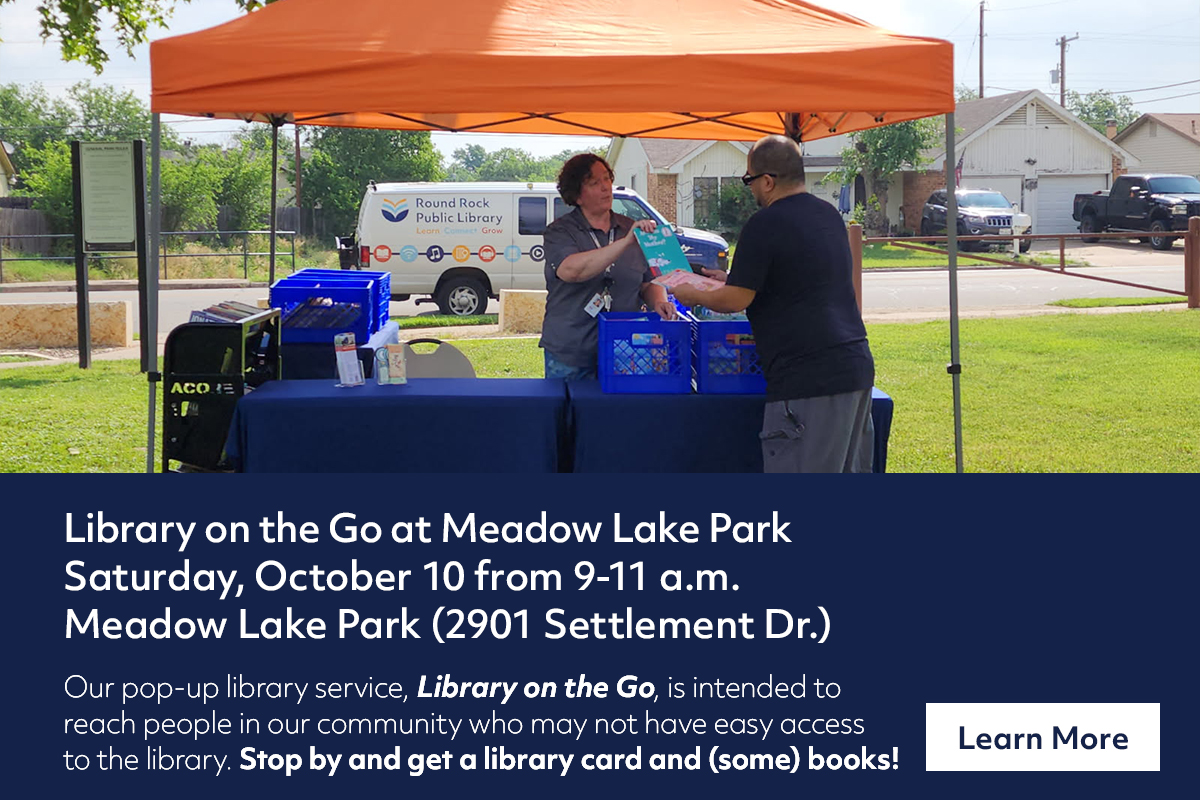 Two people stand under an orange tent at Meadow Lake Park, handing out library books from blue crates. A sign reads Round Rock Public Library. Text below provides event details for a pop-up library service.