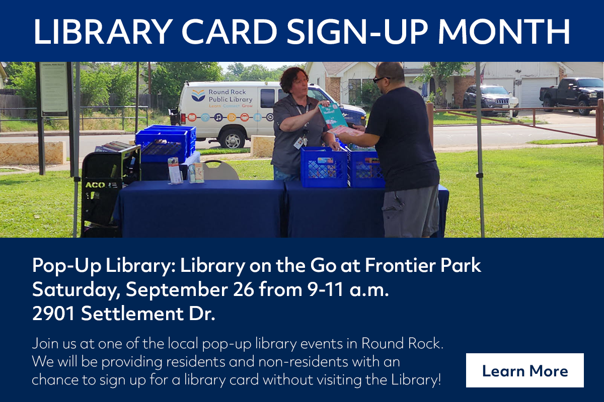 Two librarians stand at a portable library booth in a park, promoting Library Card Sign-Up Month. Text gives event details for a pop-up library at Frontier Park on September 26 from 9-11 a.m.
