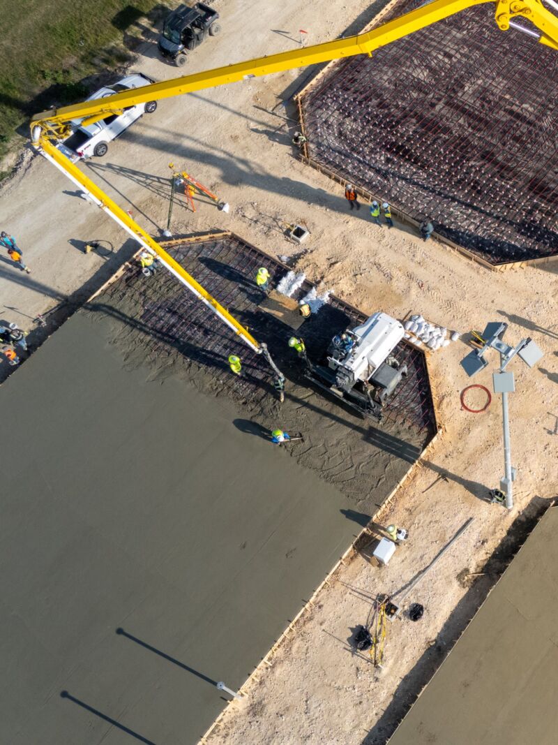 Image for the Tweet beginning: 🎾 Concrete was poured this